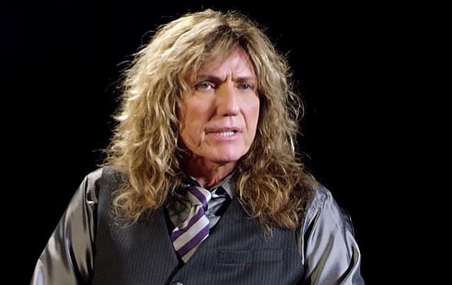 COVERDALE CHANGES HIS MIND